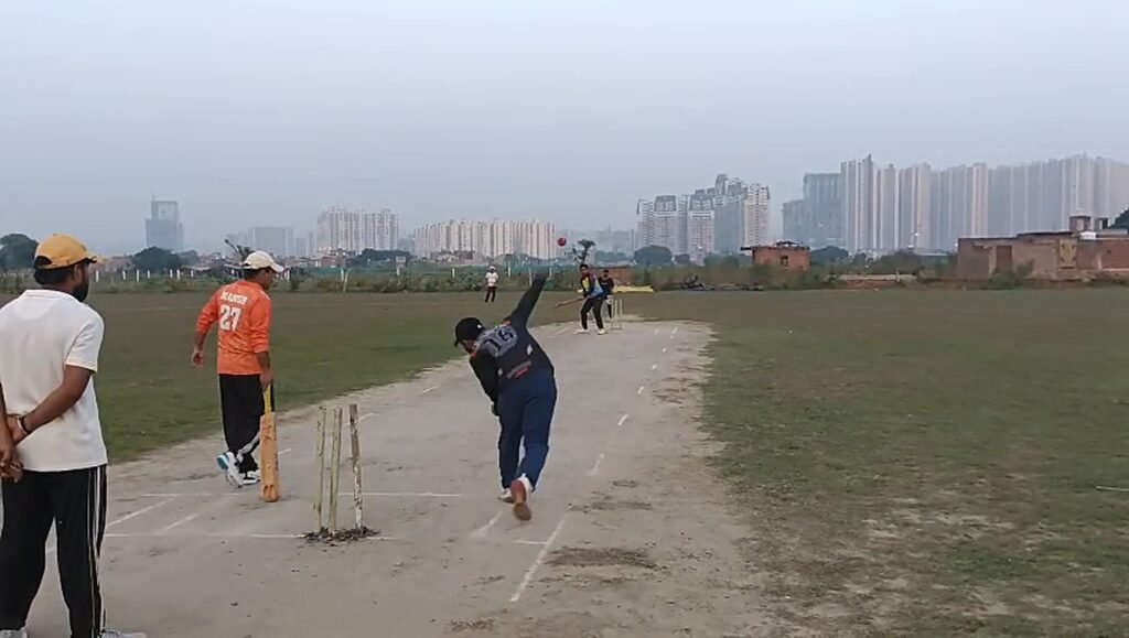 Bowler in his delivery stride during a 200-run chase in tennis-ball cricket