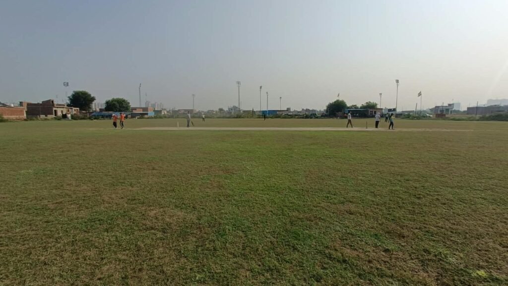 Wide view of Hare Krishna Cricket Ground 3 in Greater Noida during a 20-over tennis-ball match